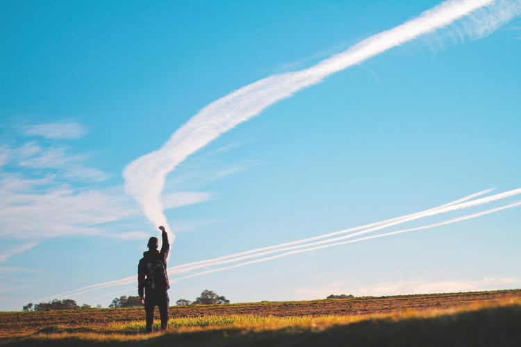 Student reaching for the sky