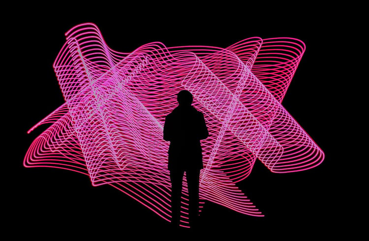 Systems thinking. Pink neon lights in wave shape